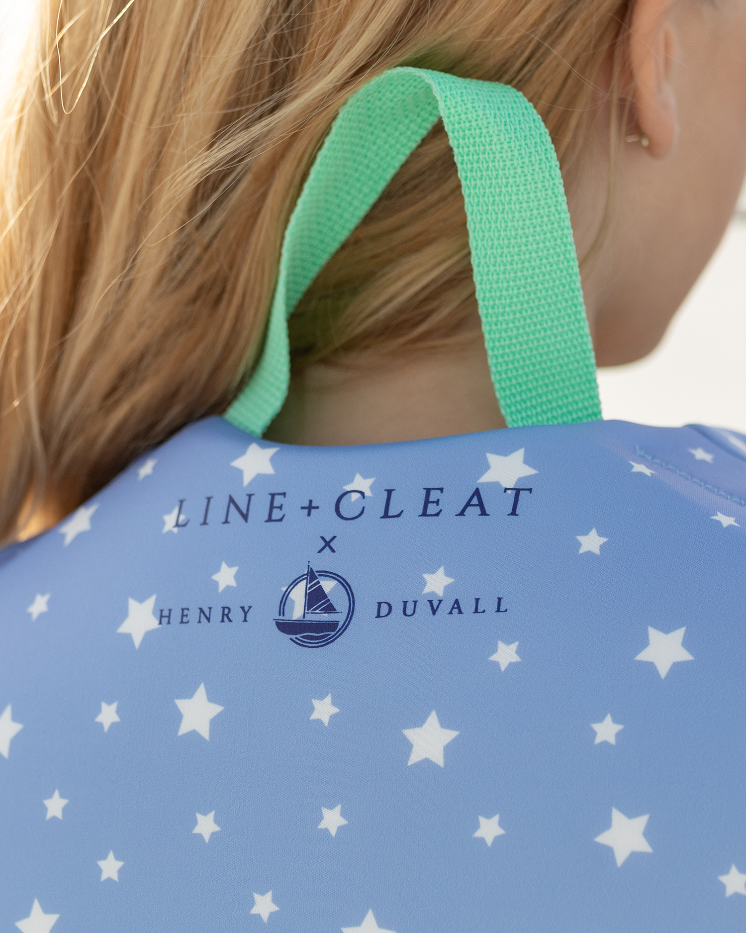 Line & Cleat + Henry Duvall collaboration children's life jacket with matching swimwear.
